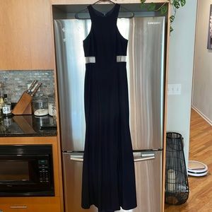 Long formal dress - worn once! Meshed cutouts to accentuate waist.